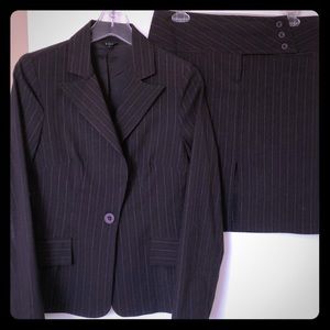 brown pinstriped skirt suit